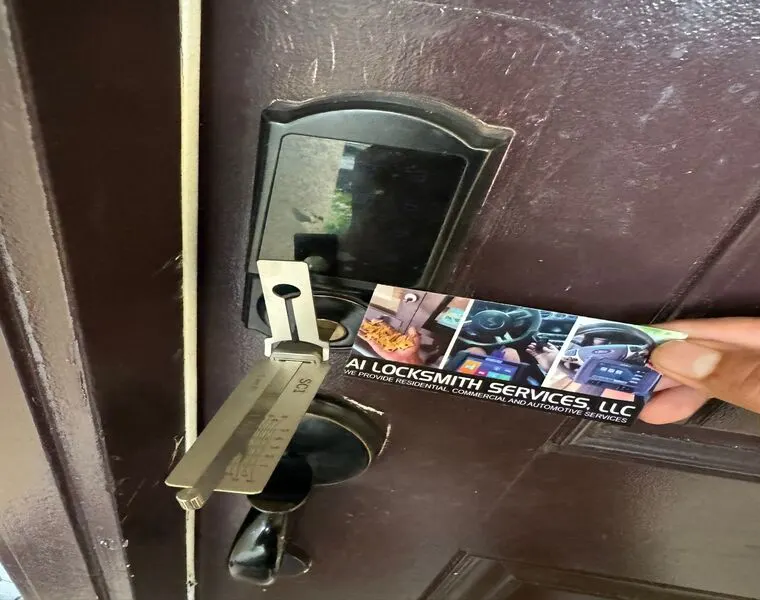 Individual grasping a key for a door lock, illustrating the importance of residential locksmith services.