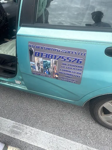 A1 Locksmith Services LLC vehicle with company branding and contact number displayed on the door, promoting professional commercial lock rekeying service for businesses.